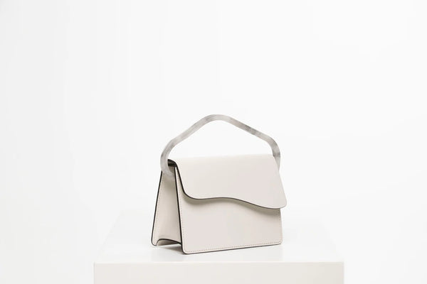 Rectangle handbag off white calf leather with natural resin handle flap closure and removable calf leather cross body strap