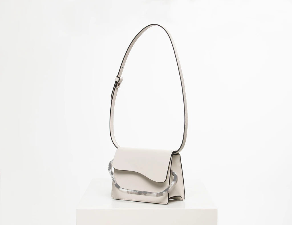 Rectangle handbag off white calf leather with natural resin handle flap closure and removable calf leather cross body strap